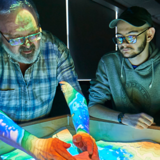 Students and instructor using the interactive sandbox